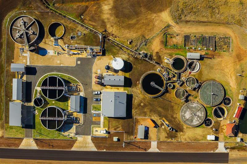 Top-down aerial view of the Kingaroy wastewater treatment plant showing its tanks and buildings