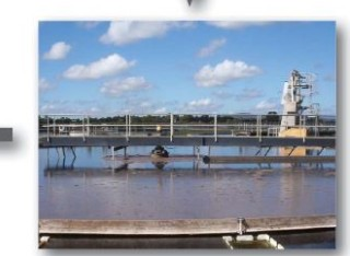 Clarification tank with a walkway bridge at a treatment plant