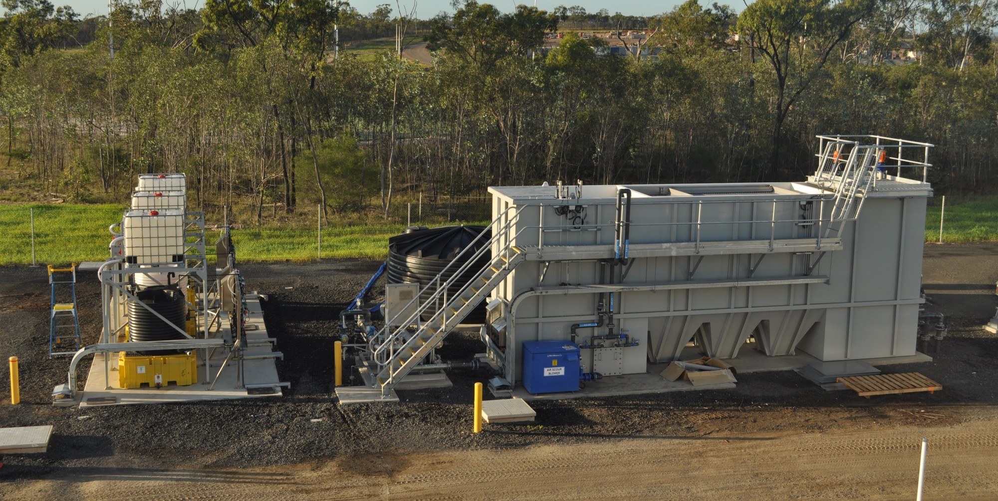 Buffel Park packaged water treatment plant with stair access and chemical dosing skid