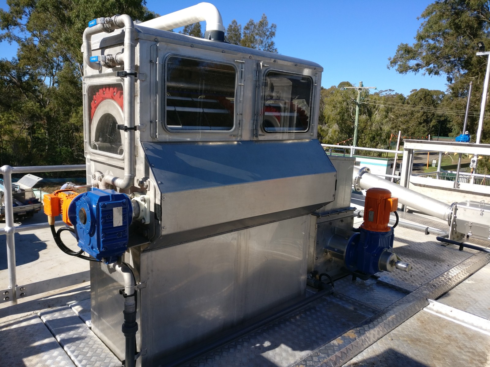 Stainless steel AquaBand screen with inspection windows and drive motors at Thornside