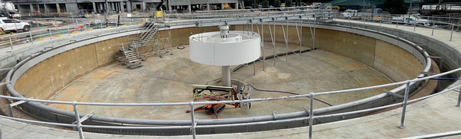 Panoramic view inside an empty AquaScraper clarifier at Rouse Hill, showing the centre feedwell and access stairs