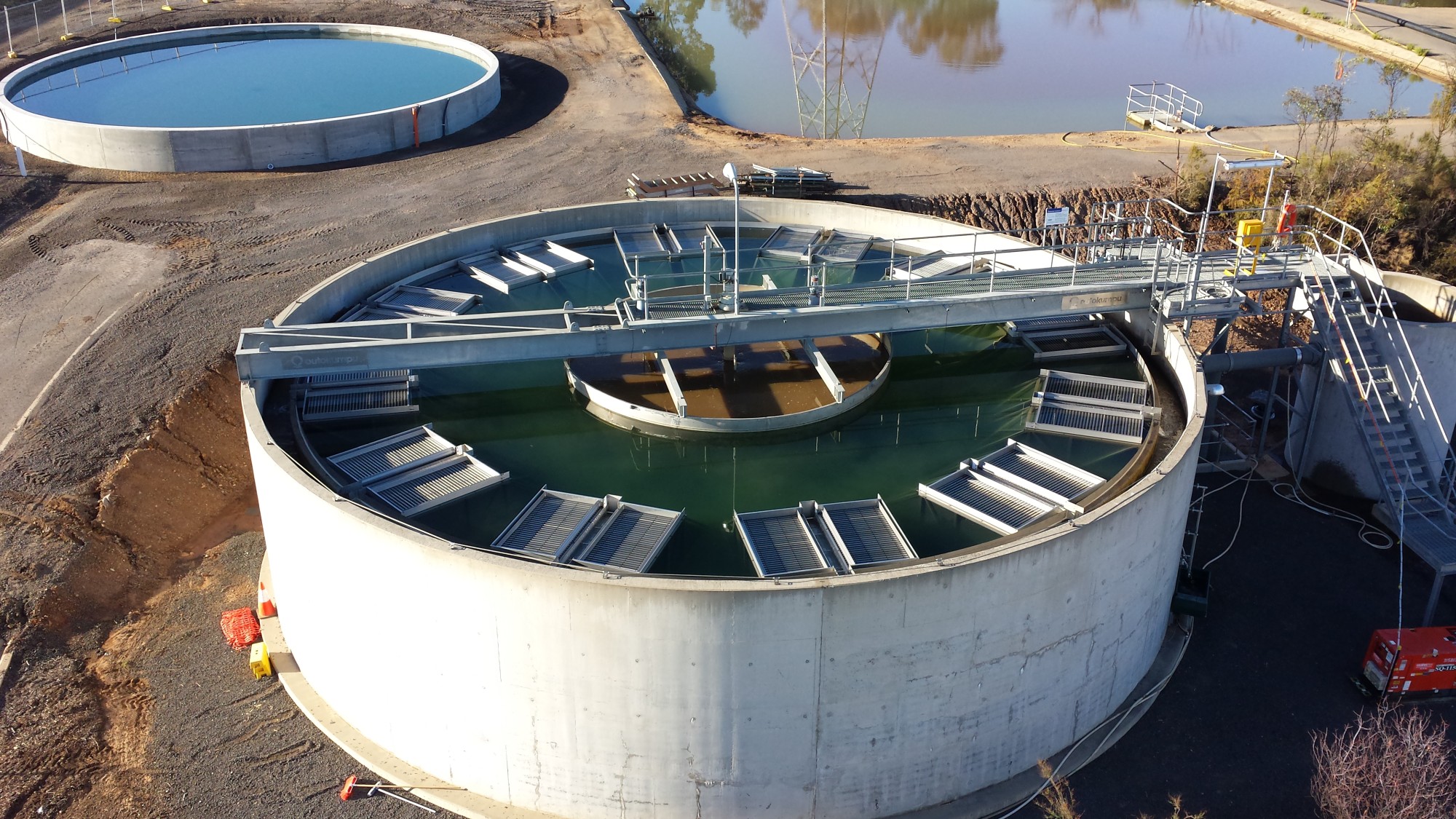 Aerial view of the circular lamella clarifier at Bendigo, with radial plate packs and an access bridge